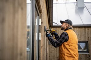 HVAC professional performing a home energy assessment